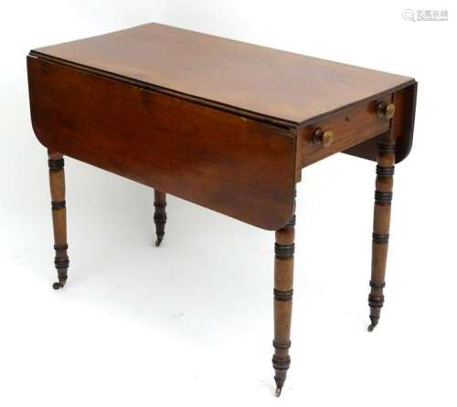 A mid 19thC mahogany pembroke table with a single end