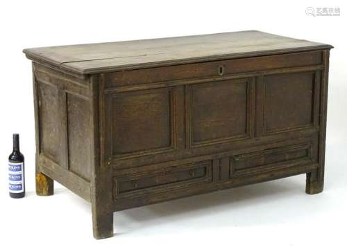 A late 17thC / early 18thC oak coffer / mule chest of