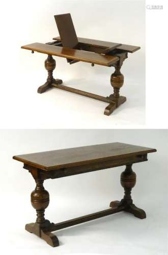 An early / mid 20thC oak refectory table, having an