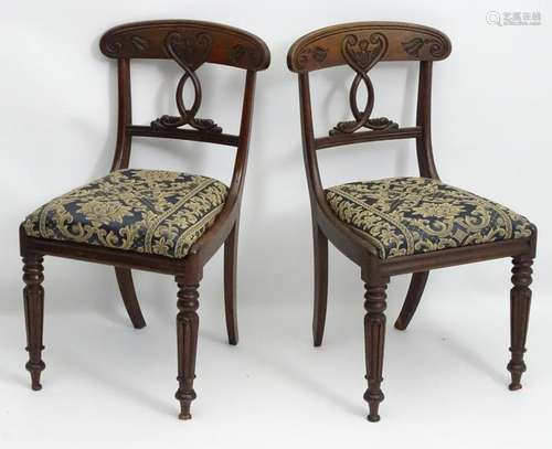 A pair of early / mid 19thC mahogany chairs, having a