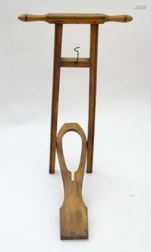 A 19thC mahogany stained beech boot pull / jack. 32