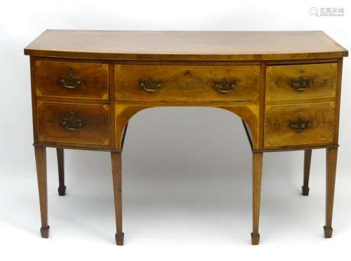 An early / mid 19thC mahogany bow fronted sideboard