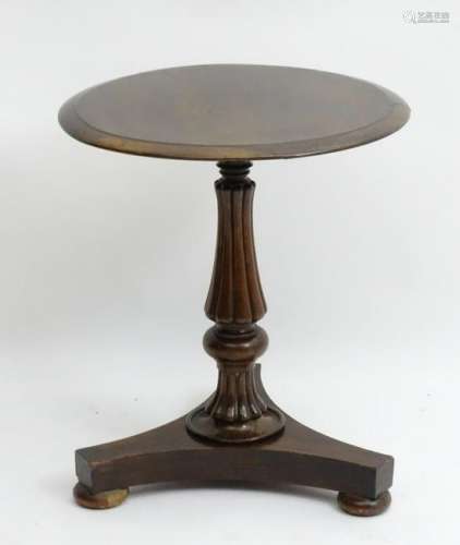 A mid 19thC rosewood occasional table, having a
