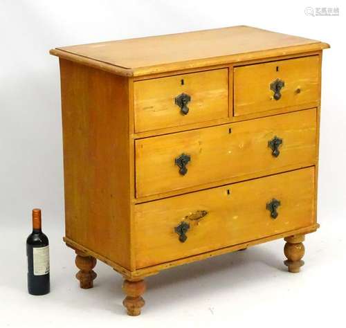 A Victorian pine chest of drawers comprising two short