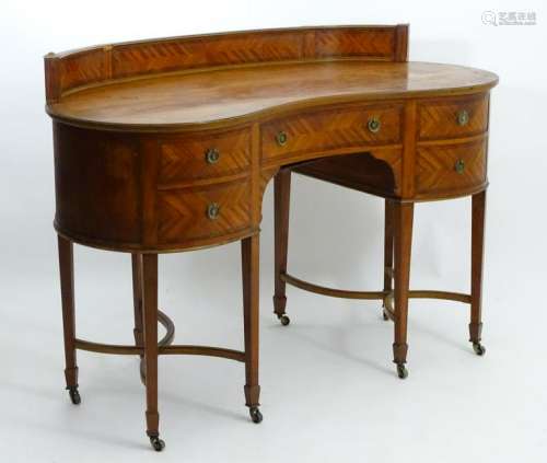 An early 20thC mahogany sideboard / dressing table of