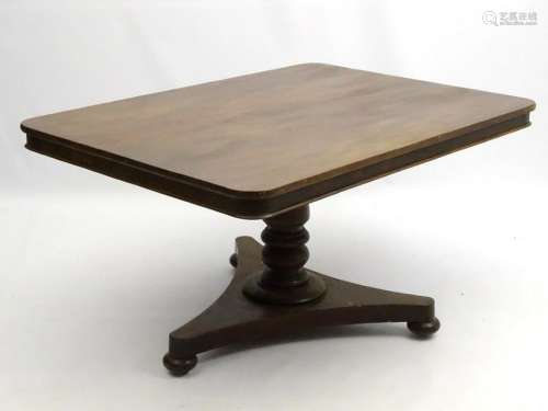 A mid 19thC mahogany tilt top breakfast table, with