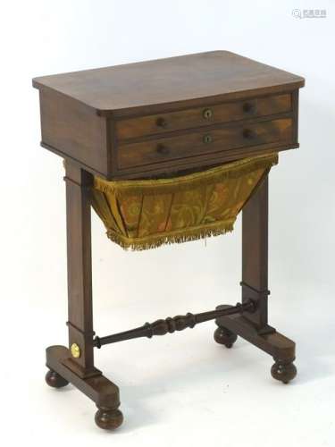 A Regency mahogany sewing table, having two drawers