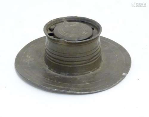 Pewter capstan inkwell: a 19thC circular hinge lidded