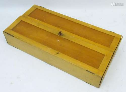 A wooden box containing a quantity of assorted vintage