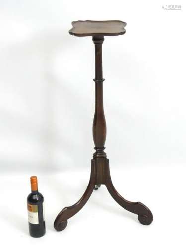 A late 19thC Anglo-Dutch mahogany torchiere, with a