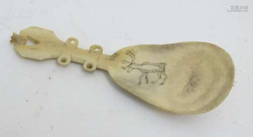 A Sami scrimshawed love token in the form of a spoon,
