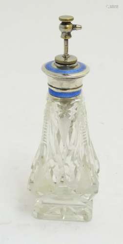Dressing table scent bottle: a cut glass bodied, four