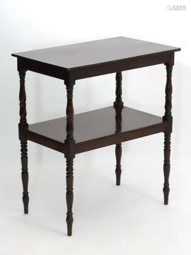 A late 19thC mahogany Aesthetic Movement two tier side