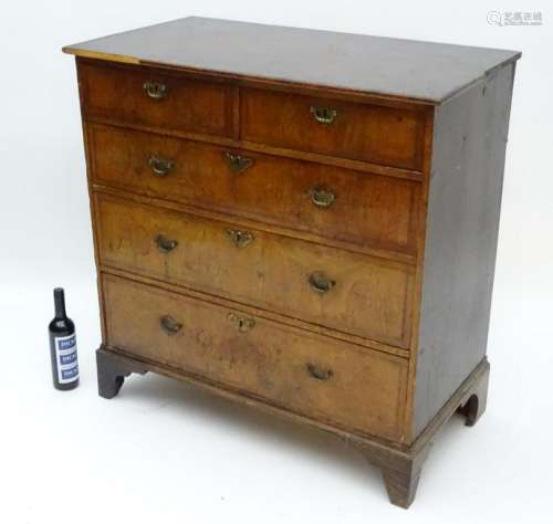 A George I 18thC walnut chest of drawers, comprising