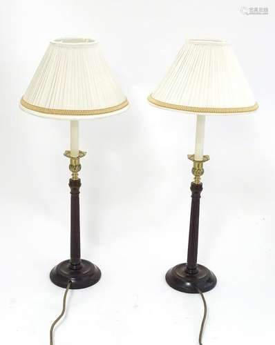 A pair of 21stC table lamps formed as columns with