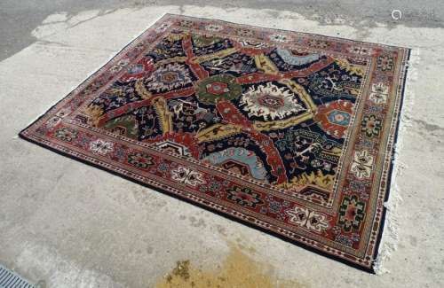Carpet rug : a large handmade woollen Persian carpet
