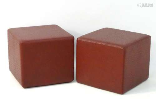 A pair of early 21st ostrich leather footstools of cube