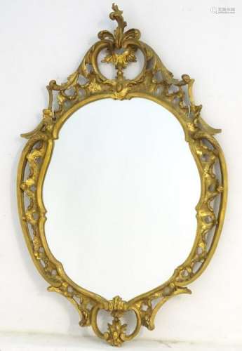 A Chippendale style giltwood mirror. 25'' wide x 29''