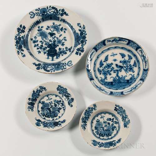 Four Floral-decorated Tin-glazed Earthenware Plates