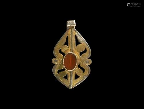 Post Medieval Gilt Pendant with Bead