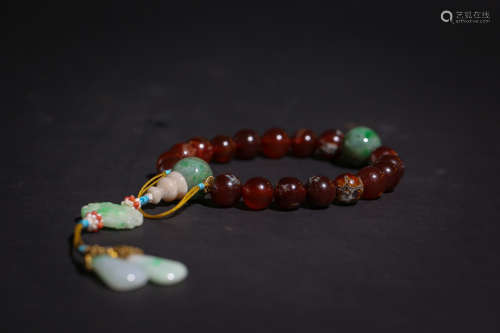 A Chinese Carved Agate Bracelet
