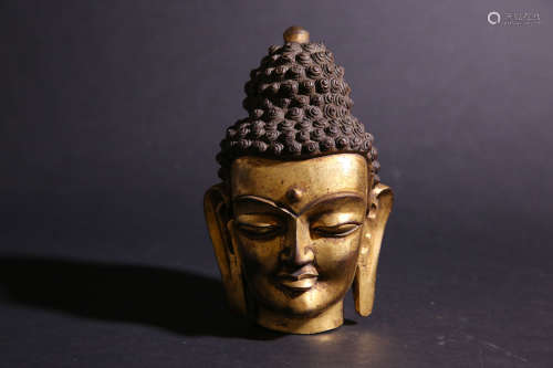 A Chinese Gilt Bronze Buddha Head
