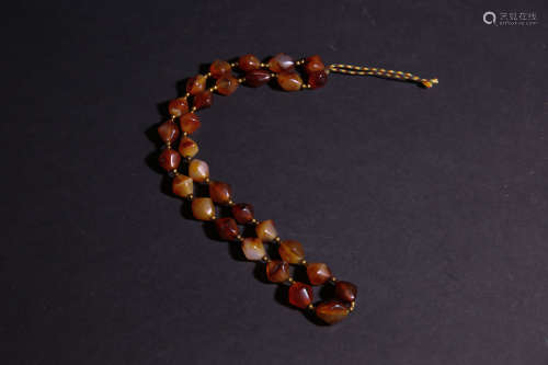 A Chinese Carved Agate Beads