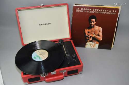 Portable Record Player and Group of Records