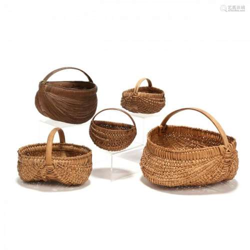 A Group of Five Vintage Buttocks Baskets
