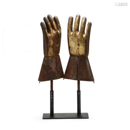 A Pair of Industrial Rubber Glove Molds Presented as